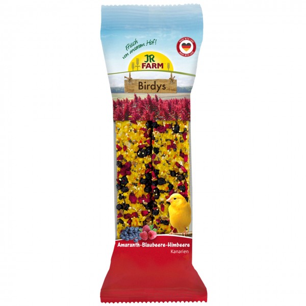 Confezione allungata JR Farm Bastoncini da sgranocchiare Birdys per canarini con amaranto, mirtilli secchi e lamponi secchi. La confezione trasparente mostra semi e frutti colorati; in basso a destra è raffigurato un canarino giallo.