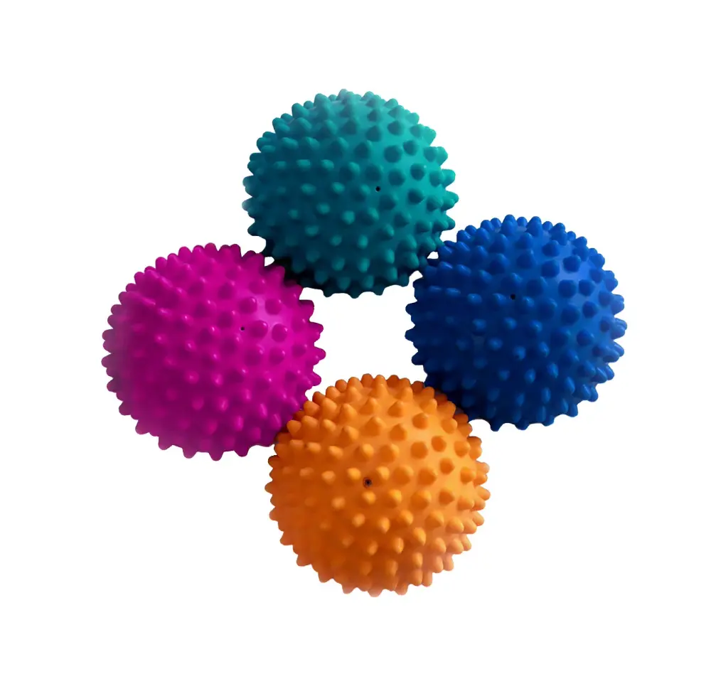 Vier runde, spiky Balance-Pods in Türkis, Magenta, Orange und Royalblau auf weissem Hintergrund. Diese luftgefüllten Trainingsgeräte fördern Gleichgewicht, Koordination und Rumpfmuskulatur bei Hunden durch Pfotenstimulation.