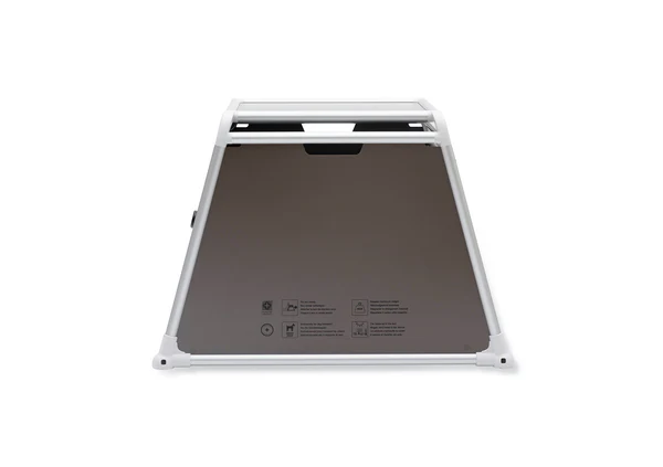 ECO 4 dog crate: Trapezoidal, grey transport crate with white frame, from the front. Small symbols on the lower edge.