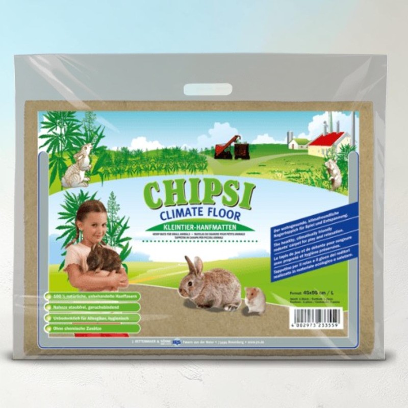 Transparente Verpackung mit Kleintier-Hanfmatten. Label: Mädchen hält braunes Kaninchen, daneben Kaninchen und Hamster. Hintergrund: Hanffelder, roter Traktor, Bauernhof. Beworben als 100% natürlich, staubfrei, geruchbindend.
