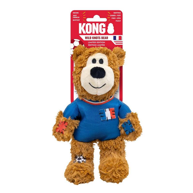 Orsacchiotto di peluche marrone come giocattolo per cani nel design della nazionale francese di calcio di Kong. Indossa una maglia blu con toppa della bandiera francese e presenta toppe sulle braccia e sui piedi con motivi calcistici e patch.