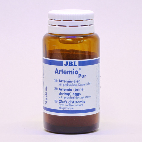 Bouteille en verre brun JBL ArtemioPur remplie d'œufs d'artémias et munie d'un bouchon à vis blanc. Étiquette avec informations sur le produit.