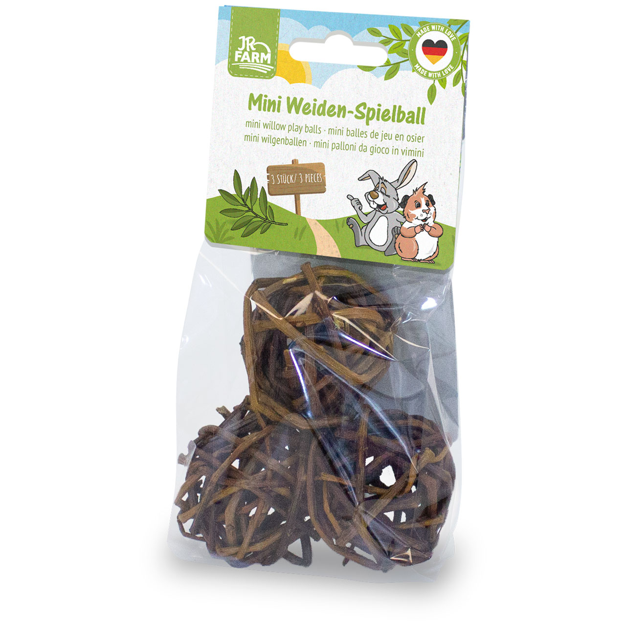 Transparente Verpackung mit drei dunkelbraunen, geflochtenen Weidenbällen für Kleintiere. Farbiges Etikett oben mit „JR FARM“-Logo, Titel „Mini Weiden-Spielball“ in Grün und Illustration von Kaninchen und Meerschweinchen. „3 STÜCK / 3 PIECES“ sichtbar.