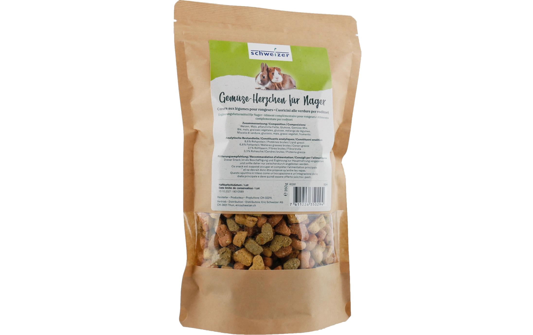 Beutel mit Nagetierfutter, Aufdruck "Gemüse-Herzchen für Nager". Unten sichtbare, herzförmige Futterstücke in Braun-, Grün- und Gelbtönen.