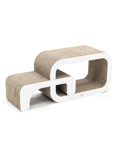 Modernes Katzenkratzmöbel aus beigefarbener Wellpappe mit eleganten weißen Kanten, bestehend aus zwei ineinandergreifenden, geschwungenen Elementen. Links eine niedrige Liegefläche, die in ein höheres, tunnelartiges Element übergeht.