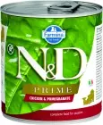 A tin of Farmina N&D Prime Puppy wet food with chicken and pomegranate against a green background.