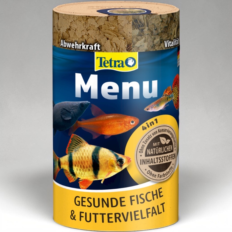 Barattolo cilindrico Tetra linea Menu per pesci con etichetta blu e gialla. In alto fiocchi di mangime grossolani. Etichetta con logo Tetra, scritta Menu e quattro pesci d'acquario. 4in1 naturali, senza coloranti né conservanti.
