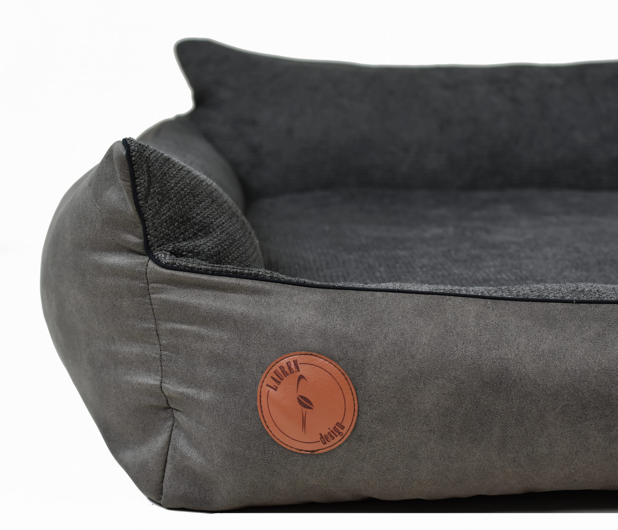 Nahaufnahme des dunkelgrauen ROCKY orthopädischen Hundebetts von Lauren Design mit erhöhtem Rand.
