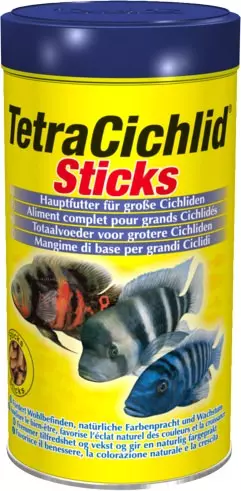Yellow tin of Tetra Cichlid Sticks fish food with three colourful cichlid fish.