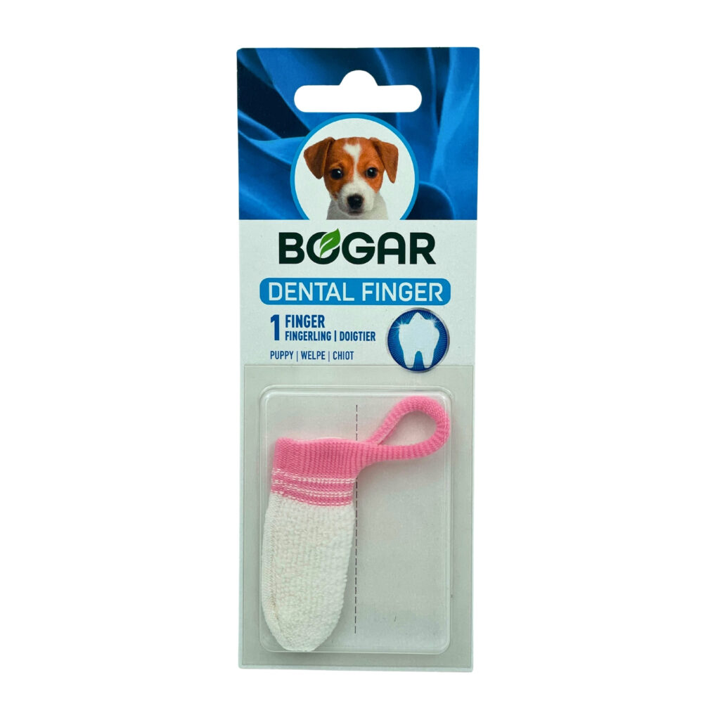 BOGAR Dental Fingerling en emballage : gant anti-plaque blanc bordé de rose avec boucle de suspension, en blister transparent. Carton avec logo Bogar, tête de chiot et mention « DENTAL FINGER » pour l’hygiène des jeunes chiens.