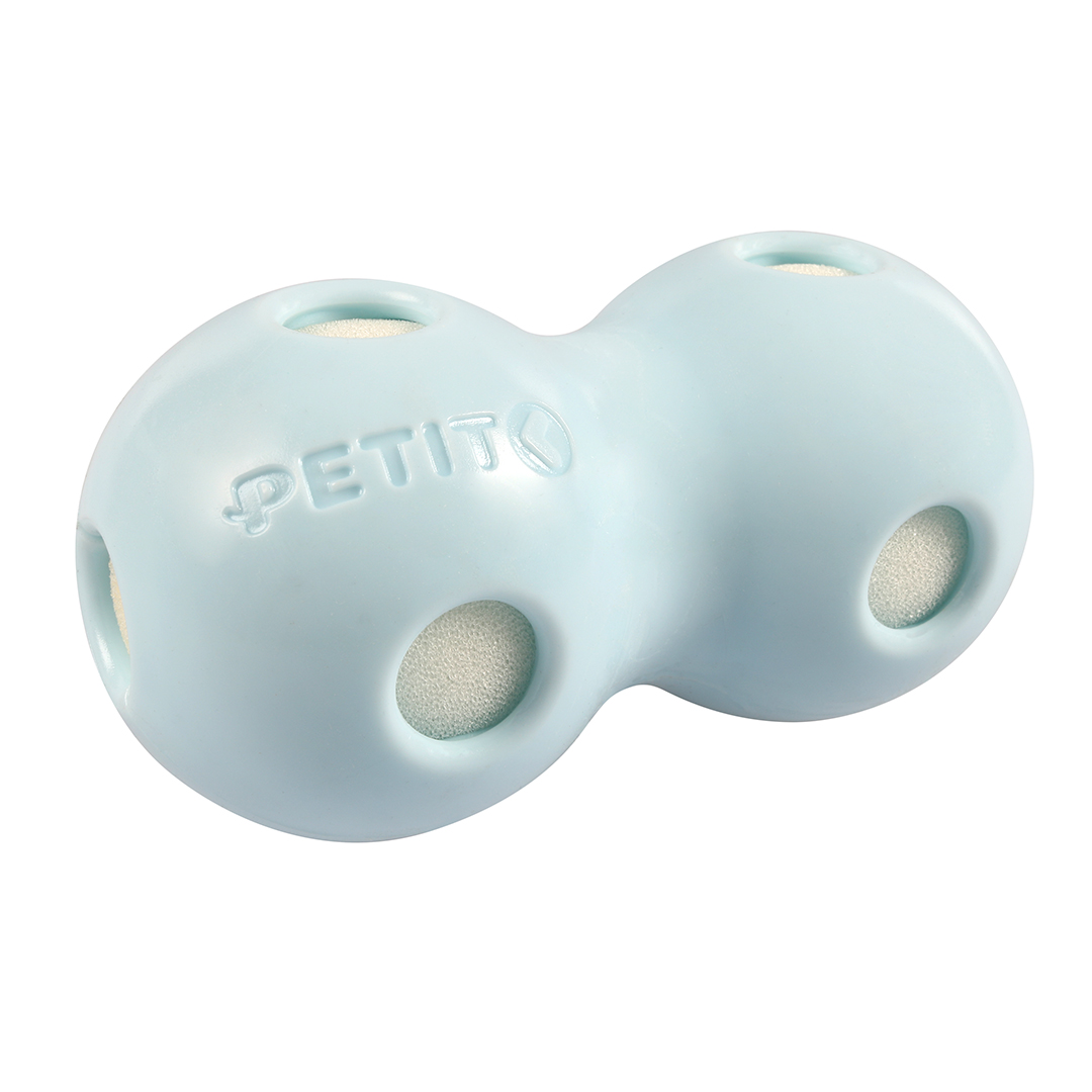 Light-coloured, blue food play ball, in the shape of a peanut, with several round openings with light-coloured, foam-like material.
