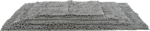 A grey, rectangular dirt-trapping mat made from a dense, deep-pile polyester fabric that effectively absorbs dirt, mud and moisture from dogs’ paws. The hard-wearing surface is ideal for entrance areas to keep floors clean.