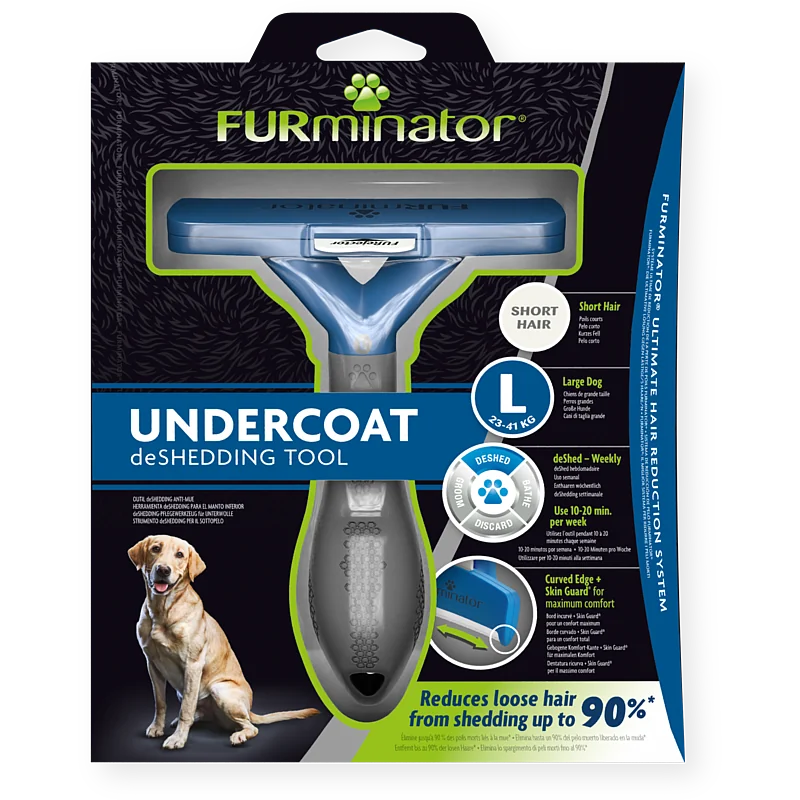 Furminator deShedding dog brush, short-haired, size L (23–41 kg). Wide stainless steel edge, ergonomic handle. Reduces loose hair by up to 90%. Golden Labrador on the packaging.