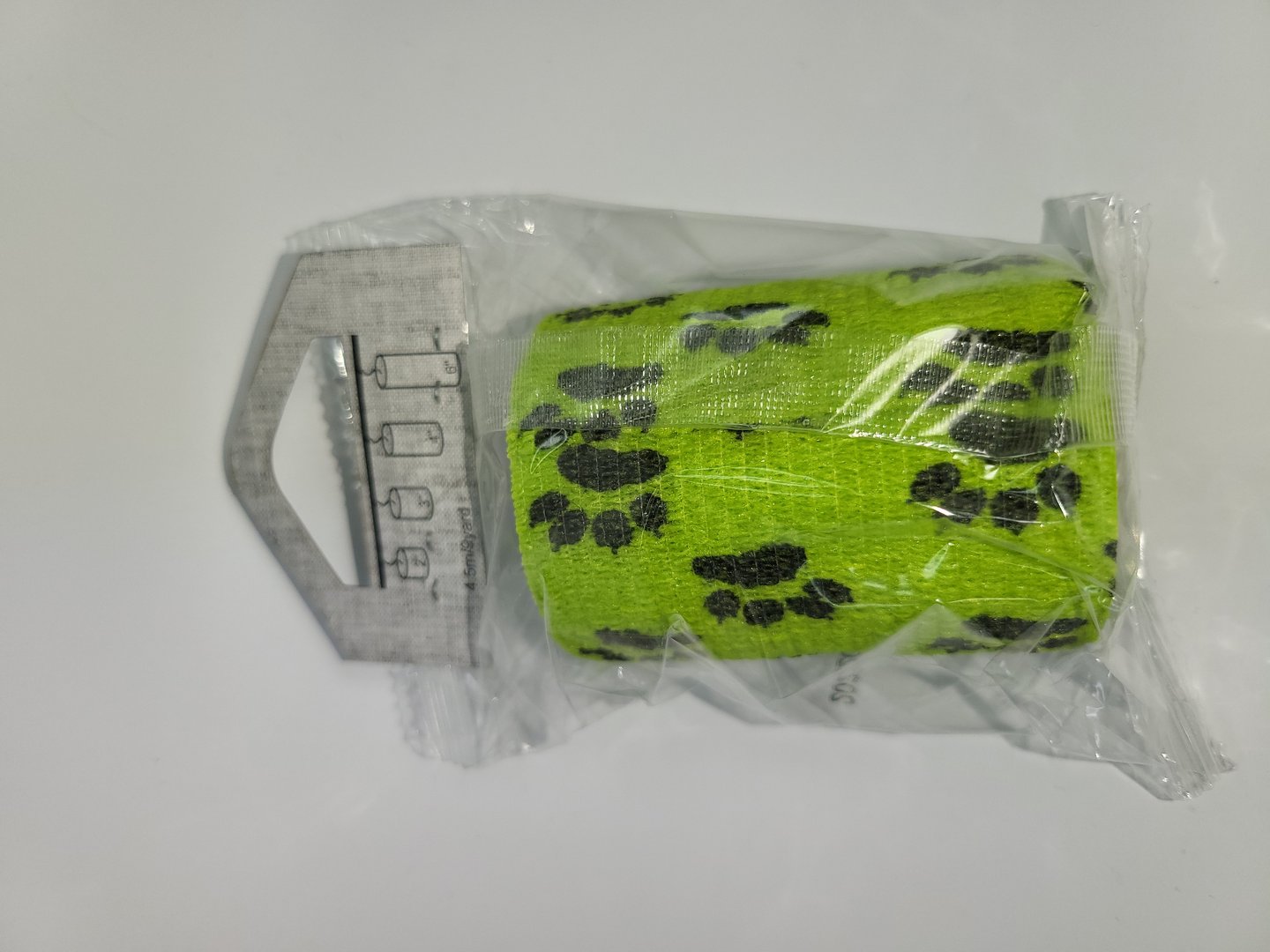 Protective bandage with paw pattern green Protective bandage with paw pattern green