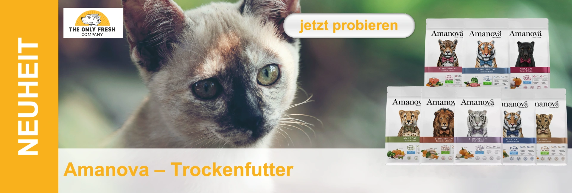 Primo piano di un gatto accanto a una pubblicità di Amanova, cibo secco con motivi animali.