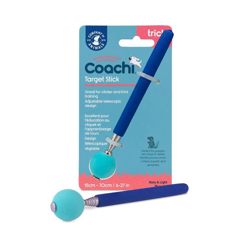 Ein navyblauer Coachi Target Stick mit hellblauer Kugelspitze liegt neben der blau-weißen Verpackung. Der ausziehbare Trainingsstick fürs Clickertraining von Hunden ist von 15 cm auf 70 cm verlängerbar, ideal für die Hundeerziehung.