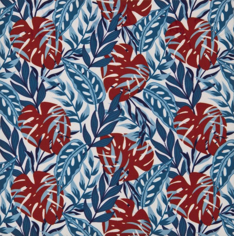 Motif textile avec des feuilles rouges et bleues sur fond blanc pour un collier martingale KAMI.