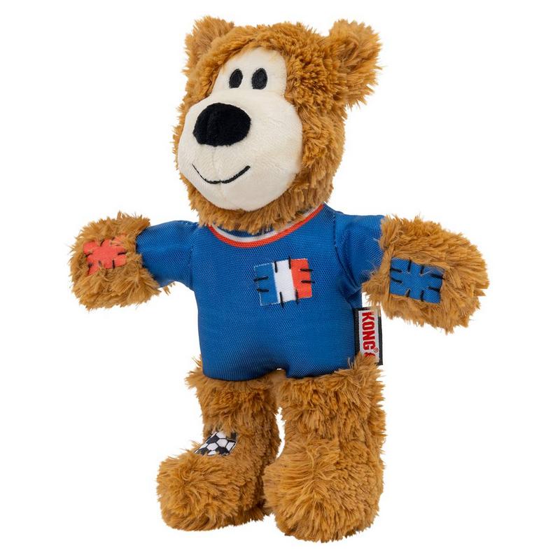Morbido orsacchiotto di peluche marrone con maglia blu e toppa nei colori della bandiera francese. Toppe ricamate sulle braccia, pallone da calcio ai piedi, etichetta Kong rossa sul fianco. Orsacchiotto Wild Knots Sport ispirato alla nazionale francese.