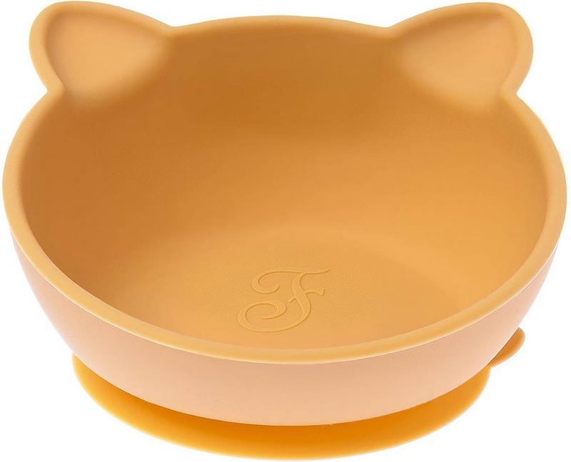 Eine orangefarbene Futterschale für Haustiere aus Silikon mit rutschfestem Saugnapfboden. Der Rand ist oben mit zwei Katzenohren geformt, im Inneren ist ein dezentes F-Logo eingeprägt.