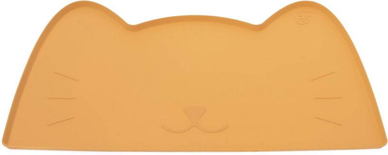 Tapis en silicone orange en forme de tête de chat avec des oreilles esquissées. Sur la surface, un petit visage de chat en relief avec un nez et une bouche, ainsi que trois fines lignes représentant les moustaches. Sert de dessous pour les gamelles.