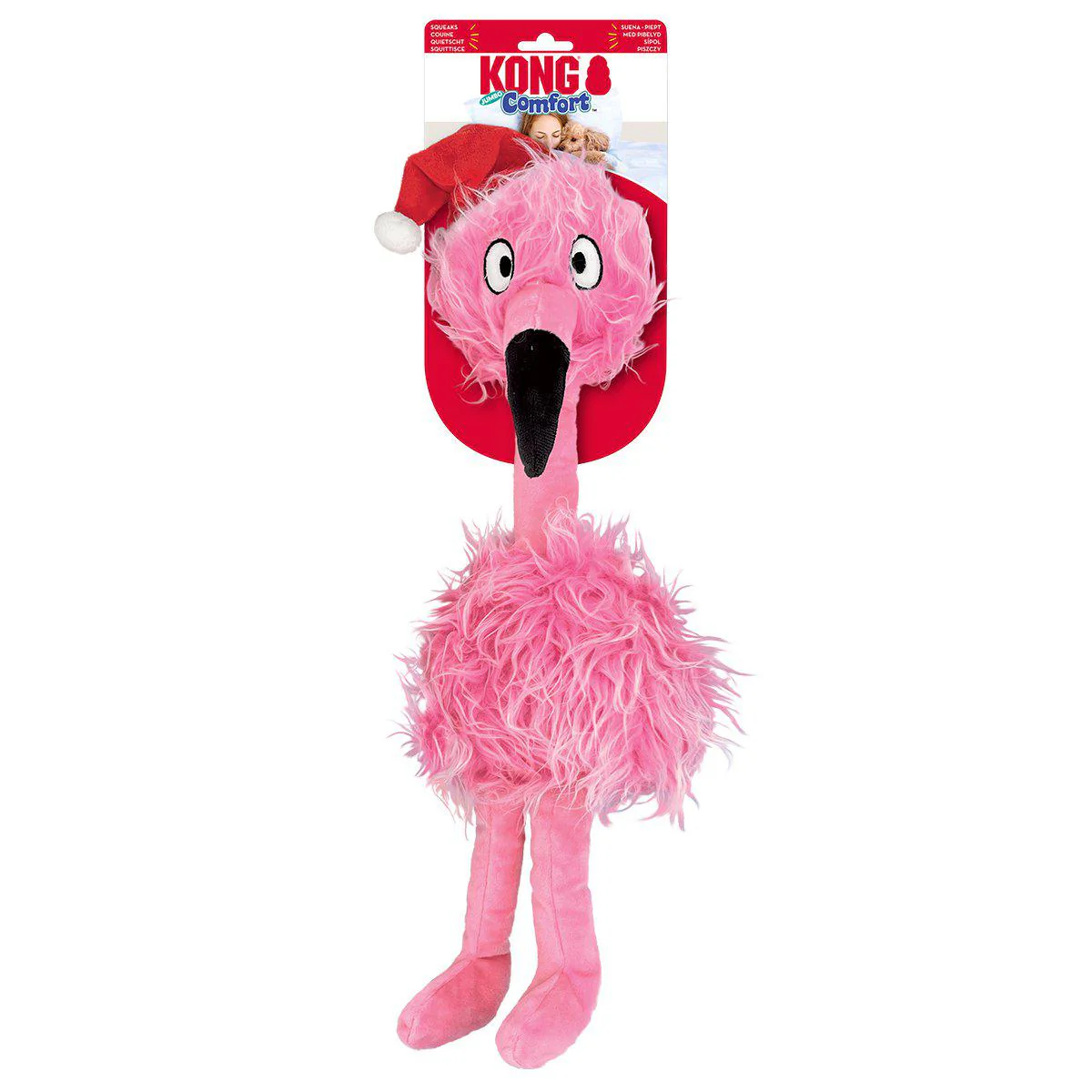 Pink flamingo dog toy with fur, red Christmas hat and black beak. Packaging with Kong Comfort logo in the background.
