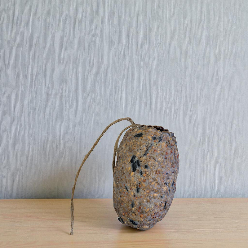 Stuffed pine cones on rope