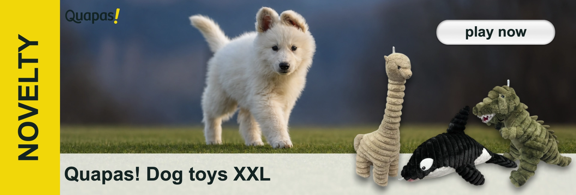 A white puppy with fluffy fur is running across green grass and looking straight ahead. To the right are three large, soft dog toys: a beige llama, a black-and-white whale and a green crocodile with visible teeth. Blurred blue background.