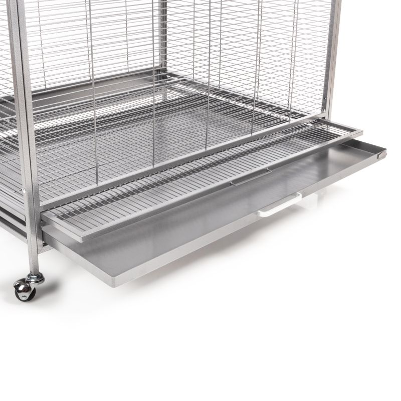 Detailed view: Pull-out tray of a silver-coloured bird aviary.