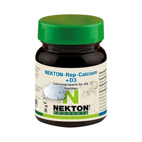 Boîte sombre avec couvercle vert, portant l'inscription "Nekton Rep Calcium +D3 ", préparation à base de calcium pour reptiles.