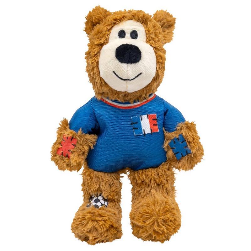 Morbido orsacchiotto di peluche marrone con faccina ricamata e naso nero. Indossa una maglietta blu con colletto nei colori nazionali francesi e la bandiera francese sul petto. Robusto giocattolo per cani, perfetto per giocare e coccolarsi.