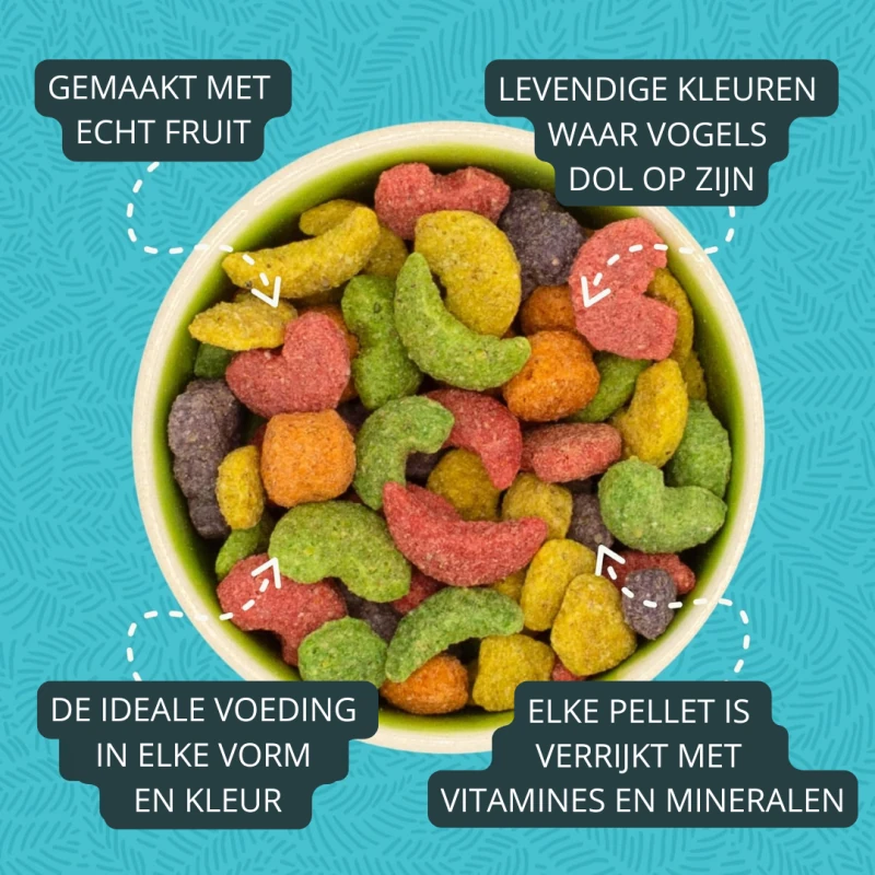 Contenitore chiaro con pellet colorati per uccelli nei colori rosso, verde, giallo, arancione e viola. A forma di cuore, mezzaluna e forme irregolari. A base di vera frutta, arricchiti con vitamine e minerali per un'alimentazione ideale degli uccelli.