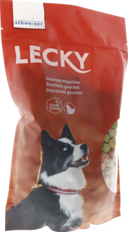 Sachet à fond plat orange-rouge « Lecky » – friandises gastronomiques pour chiens. Illustration : chien noir et blanc aux yeux bleus, collier rouge, regard attentif. Fenêtre transparente : friandises rondes vertes et beiges.