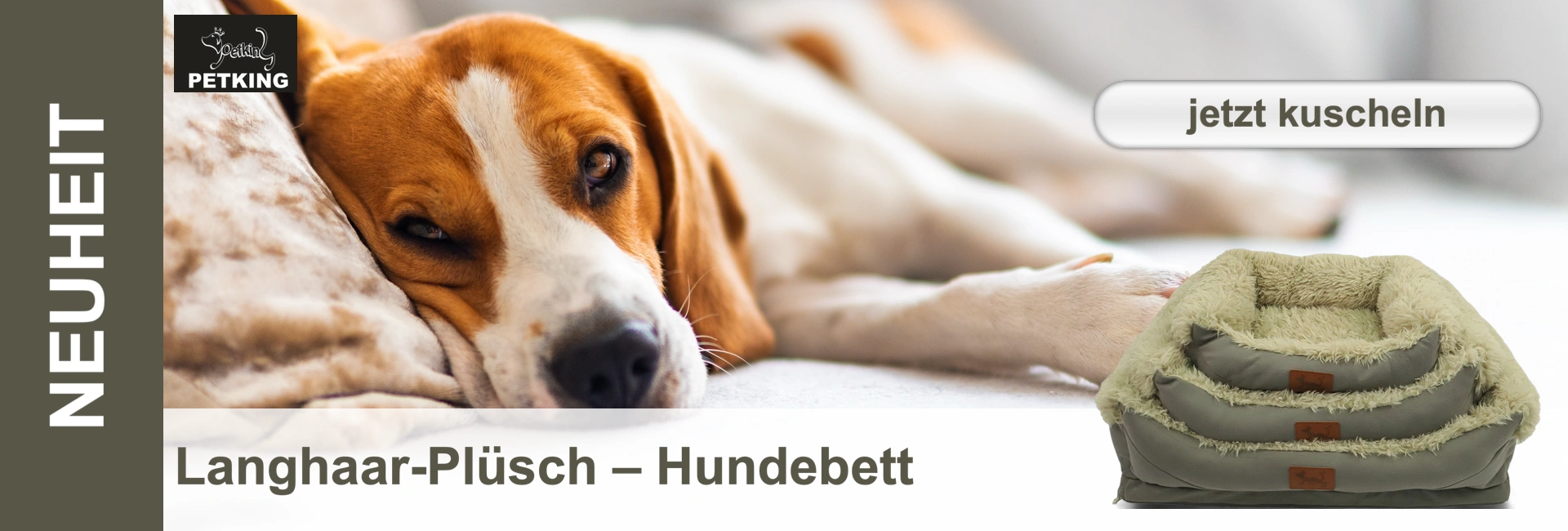 Un beagle si sdraia su una cuccia beige e si rilassa. Un'altra cuccia di colore grigio-beige si trova sulla destra.